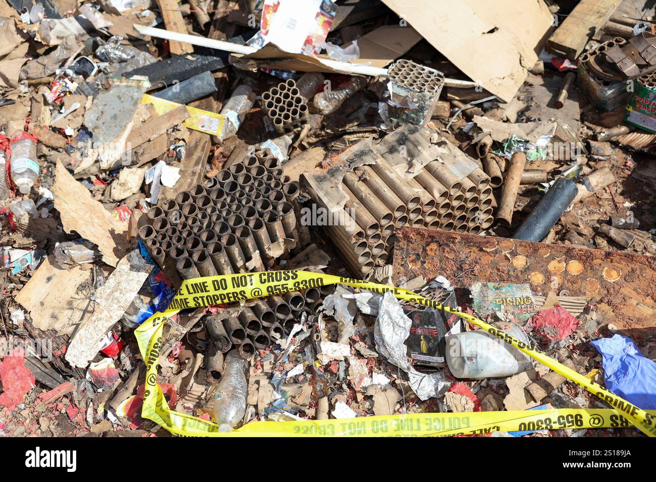 Fireworks debris is seen outside the home where a New Year's Eve