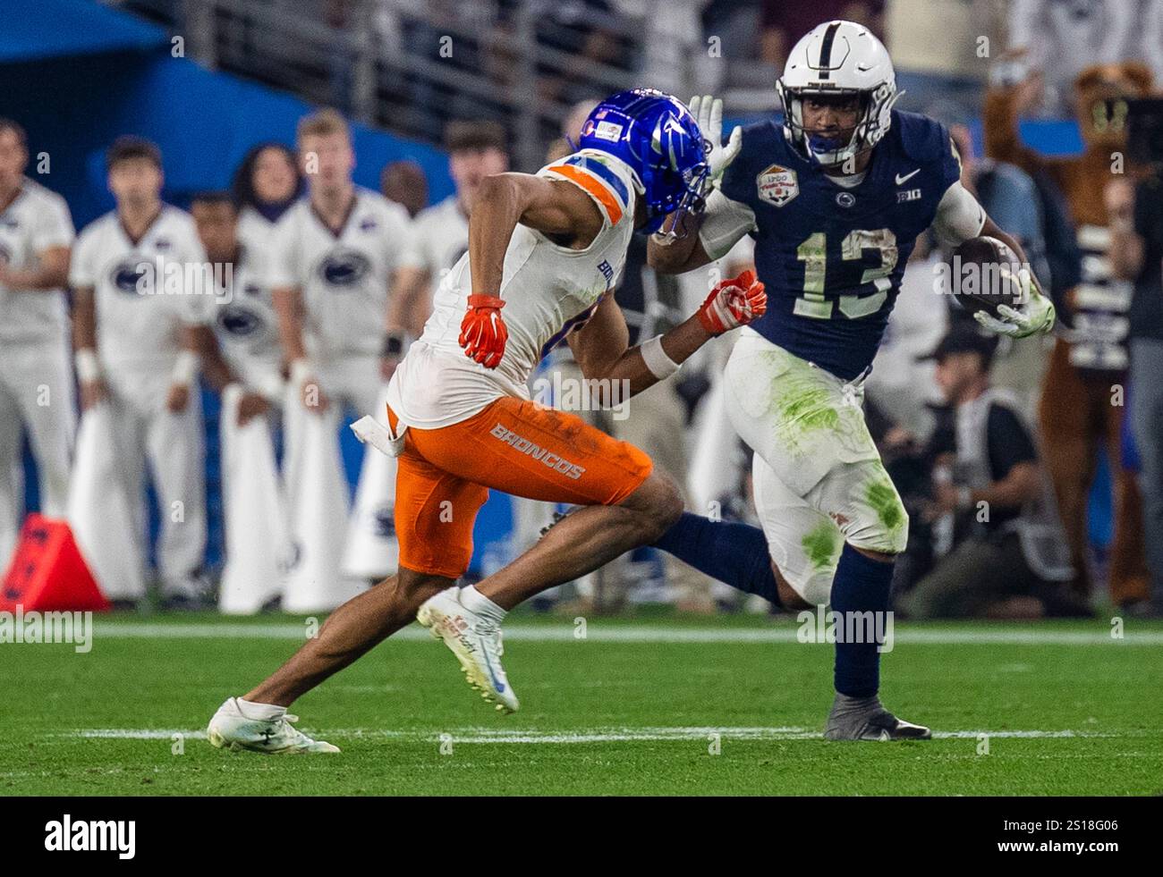 December 31 2024 Glendale, AZ U.S.A. Penn State running back Kaytron Allen (13) runs for a long gain during the NCAA Vrbo Fiesta Bowl Playoff Quarterfinal football game between Penn State Nittany Lions and the Boise State Broncos. Penn State beat Boise State 31-14 at State Farm Stadium Glendale, AZ Thurman James/CSM (Credit Image: © Thurman James/Cal Sport Media) Stock Photo