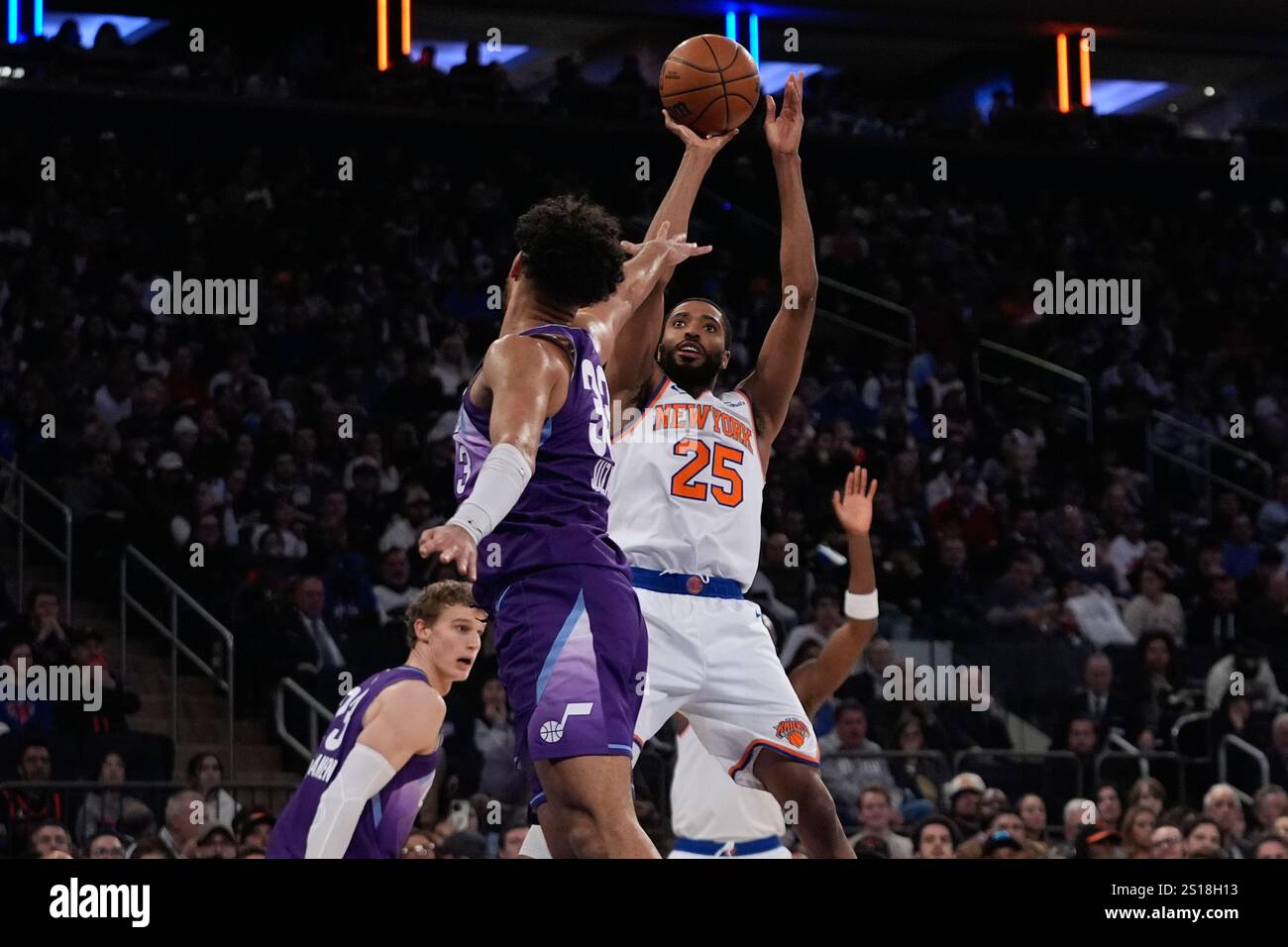 New York Knicks' Mikal Bridges (25) shoots over Utah Jazz's Johnny