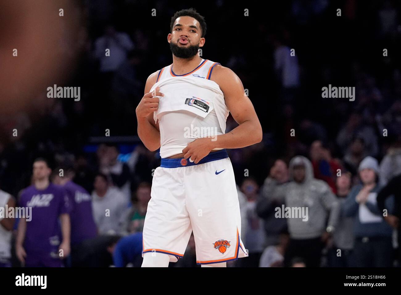 New York Knicks center Karl-Anthony Towns calls out to fans during the ...
