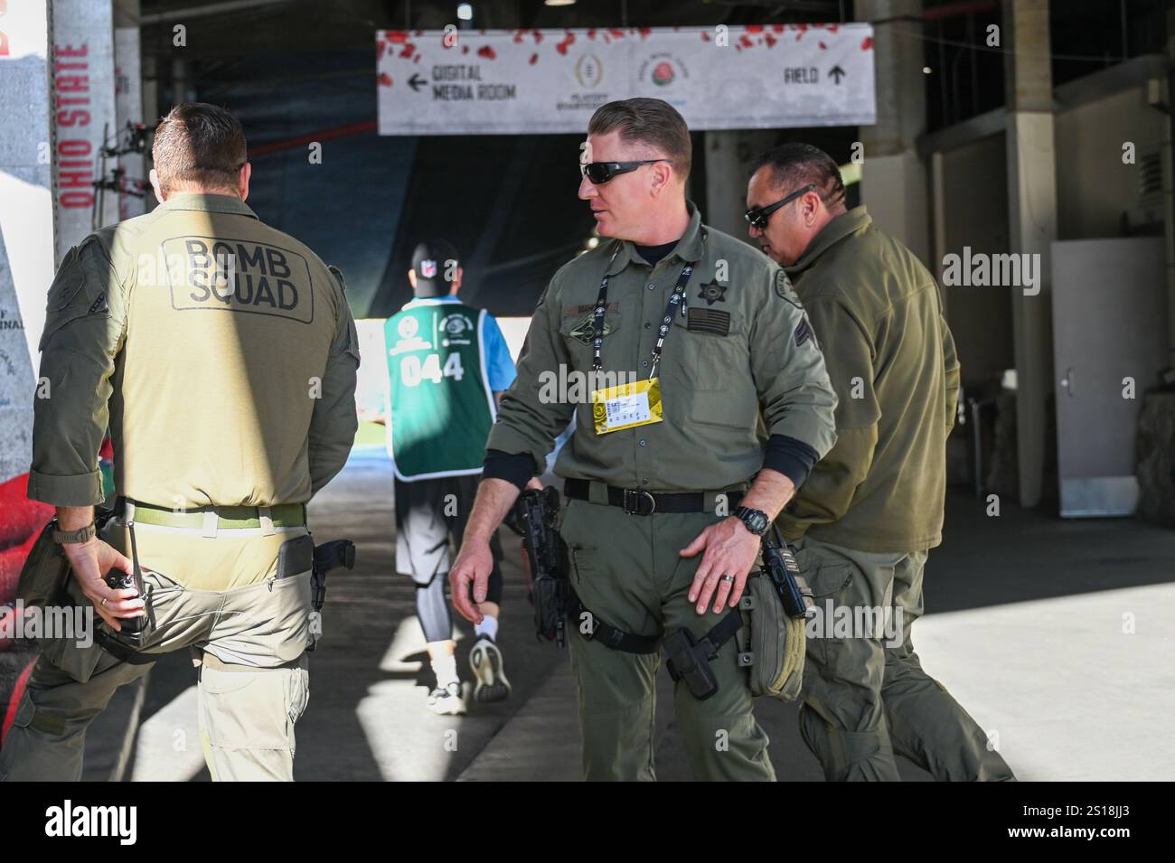 The Los Angeles County bomb squad stands in the tunnel of Rose Bowl