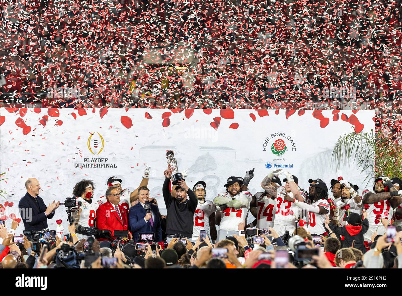 Ohio State head coach, Ryan Day and players celebrate after winning the 2025 Rose Bowl game