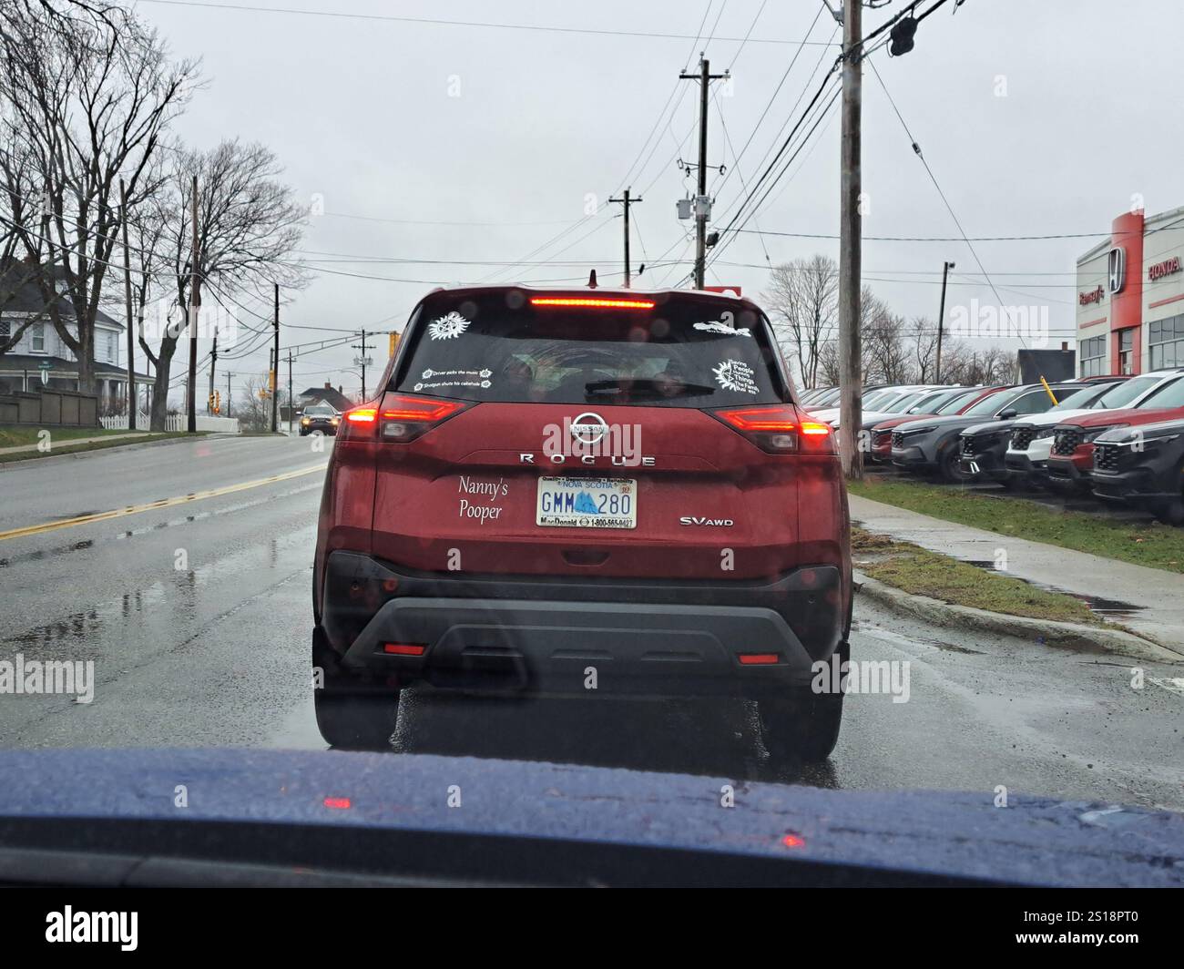 Nanny's Pooper sign on a car in Sydney, Nova Scotia, Canada Stock Photo ...