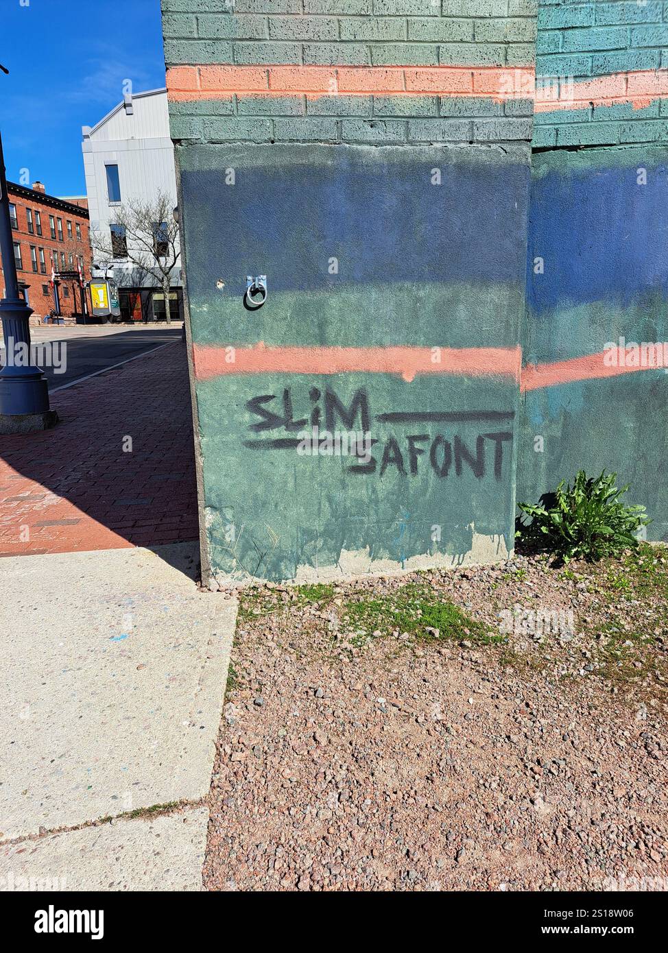 Artist's sign for train conductor mural on Main Street in downtown ...