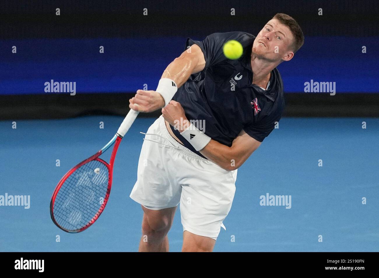 Britain's Billy Harris serves to Poland's Hubert Hurkaz during their