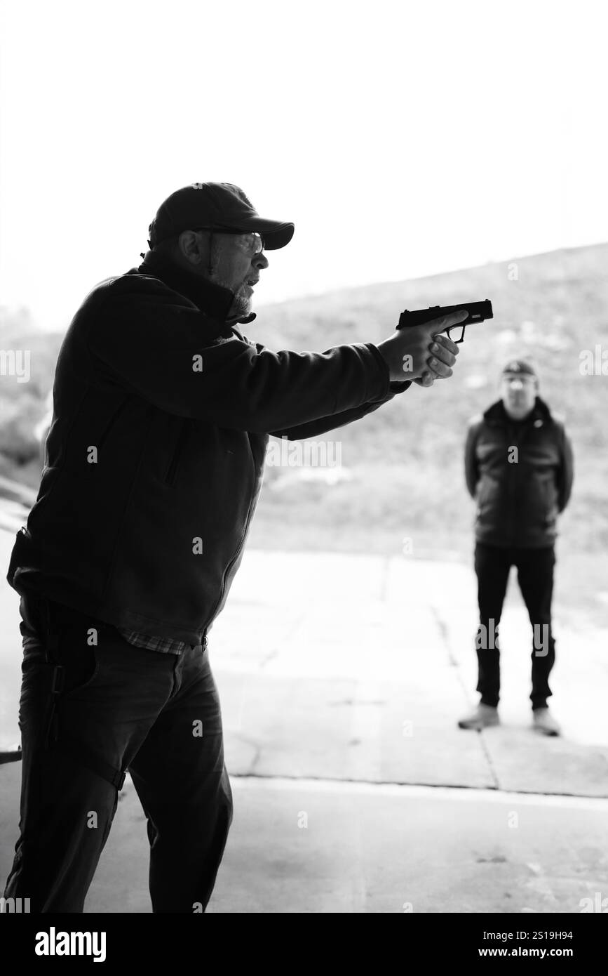 Shooting weapons instructor hi-res stock photography and images - Alamy