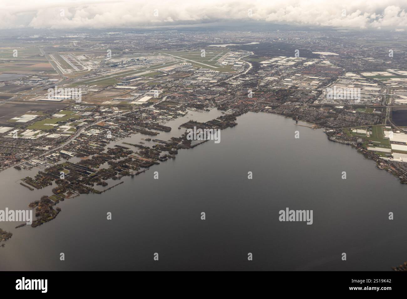 Aerial view of Westeinderplassen lake and Amsterdam Airport Schiphol ...