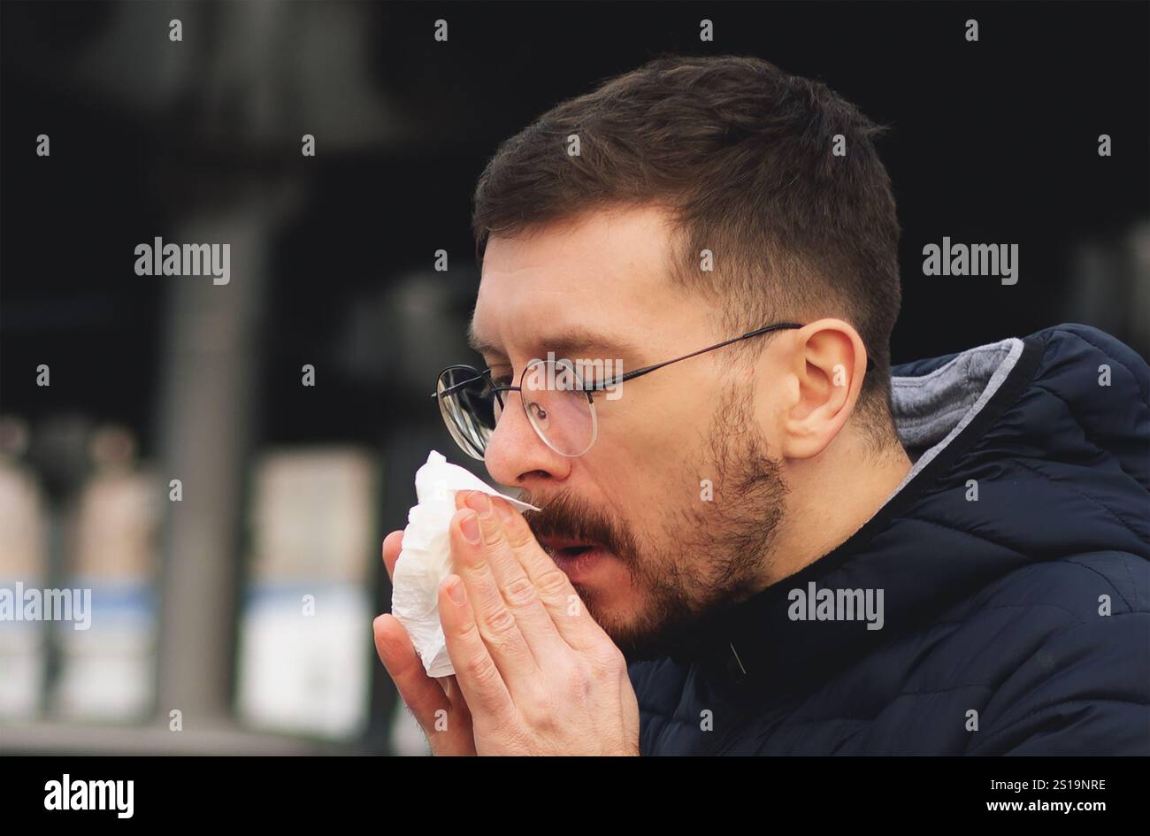 guy with a cold and a runny nose Stock Photo - Alamy