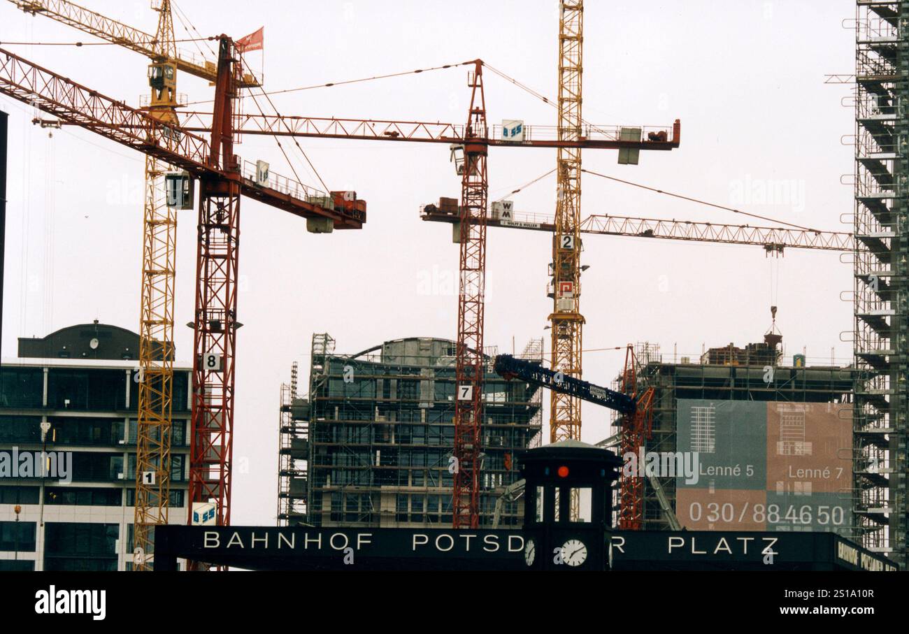 Construction cranes against the sky in Berlin Stock Photo - Alamy