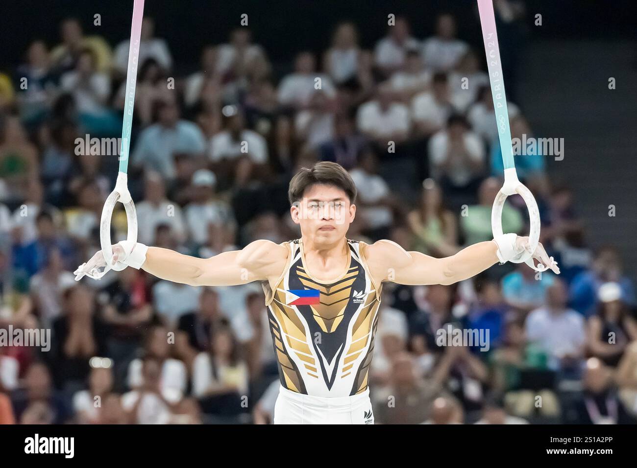 Jul 31, 2024-Paris, FRA;  Carlos Edriel Yulo (PHI) of Philippines, competes in the Men's All-Around Finals at the Stade de France Stadium during the 2024 Paris Summer Olympics in Paris, France. Stock Photo