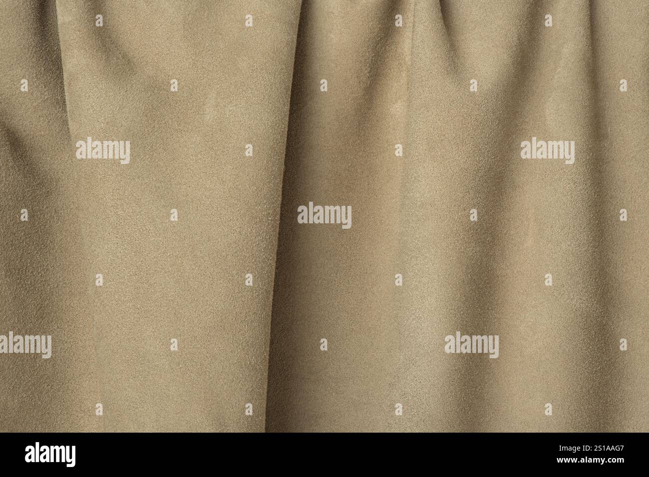 Beige suede wrinkled background. Suede leather texture Stock Photo
