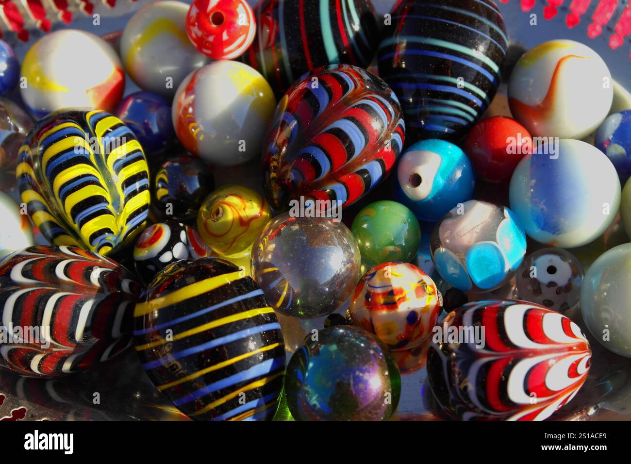 Background with various multicolored marbles Stock Photo
