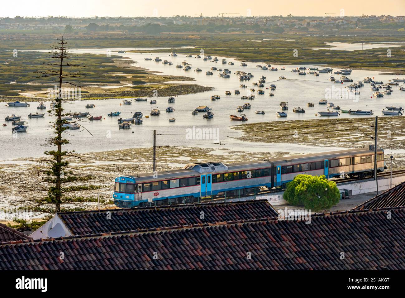 Portugal, Algarve, Faro, the old town, the Algarve railway line (Linha do Algarve) which connects the city of Lagos to that of Vila Real de Santo Antonio on the edge of the Ria Formosa Natural Park Stock Photo