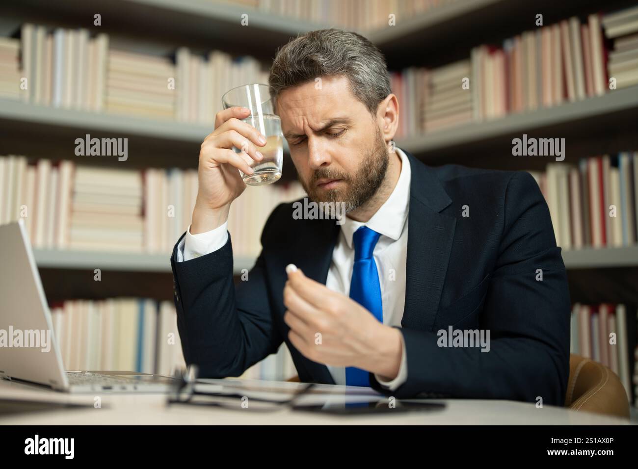 Tired, headache and eye strain on laptop. Man with stress, burnout and ...