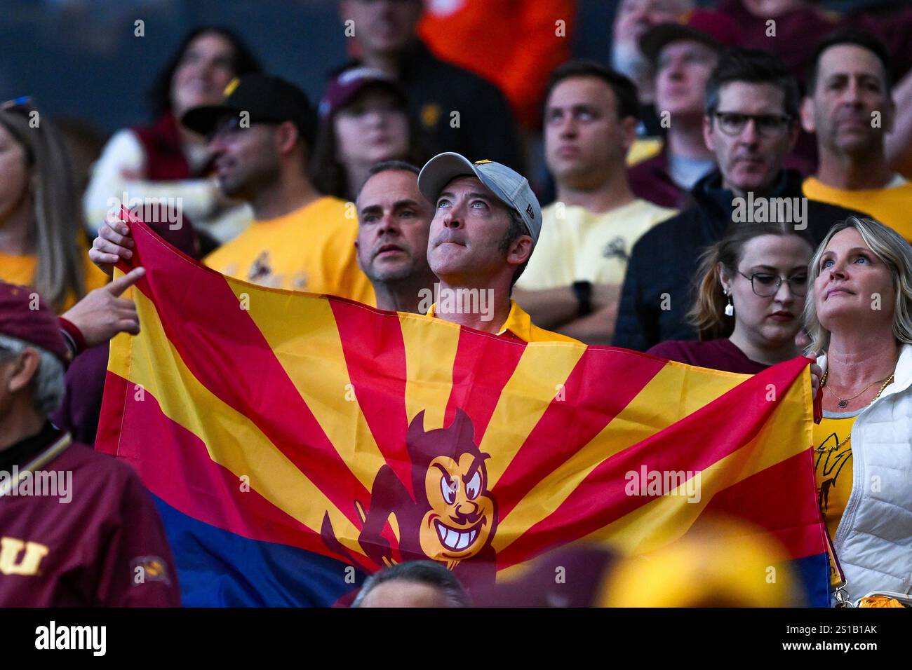 atlanta-ga-january-01-an-asu-fan-with-a-flag-prior-to-the-start-of
