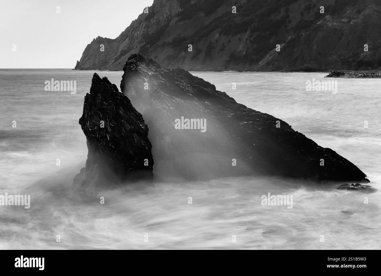 Long exposure of rocks and Waves in sea, Cinque Terre, La Spazia, Italy - Smartphone Captured Stock Image