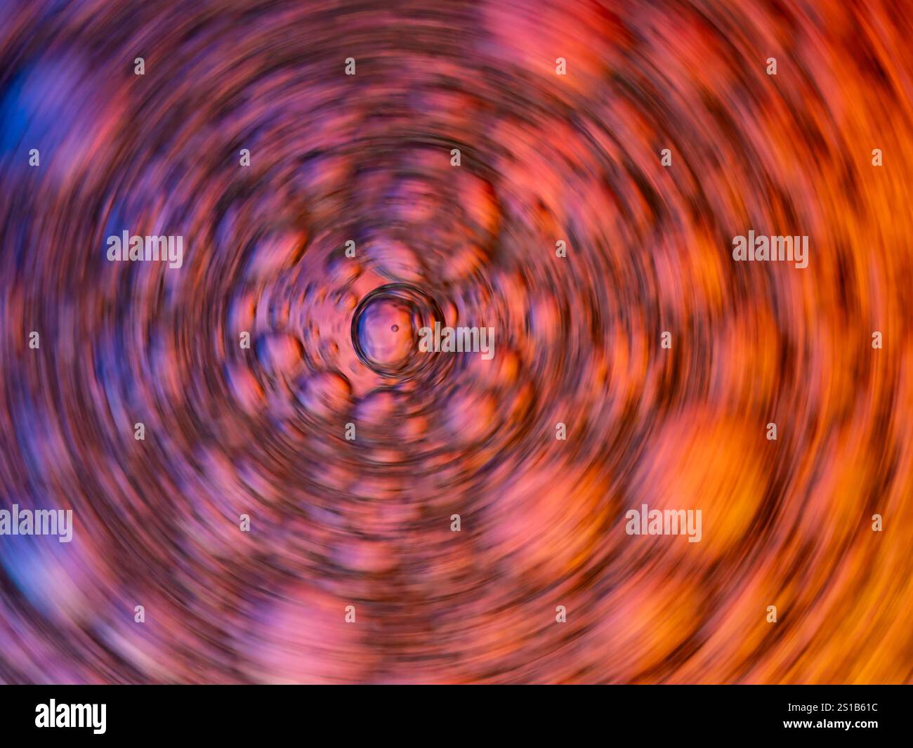 Dynamic, abstract, stientific background with blurry air bubbles. Swirling movement, orange-purple colors. Stock Photo