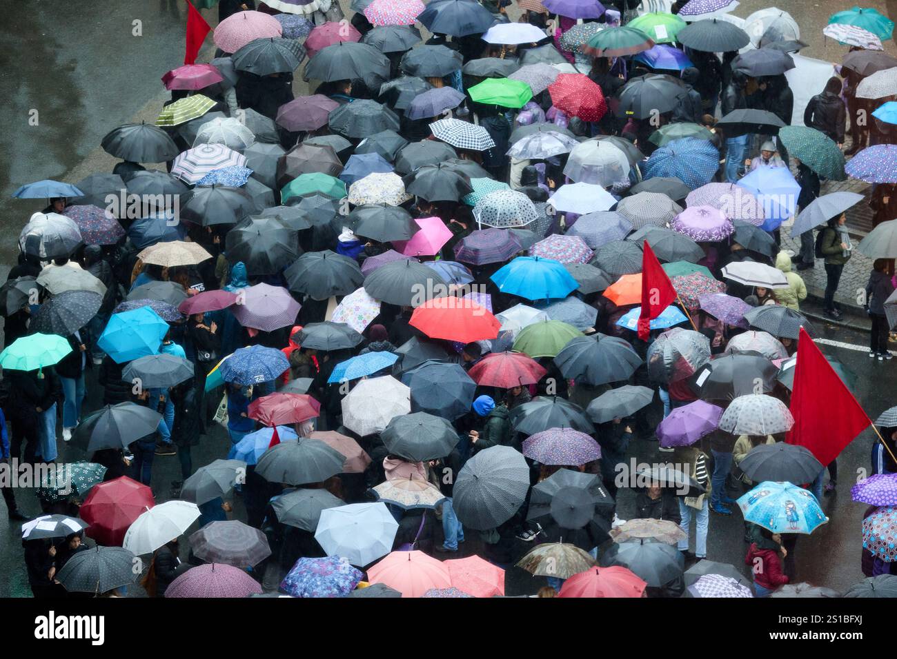 Demonstration of people with umbrellas on the street, Bilbao, Basque Country, Spain Stock Photo