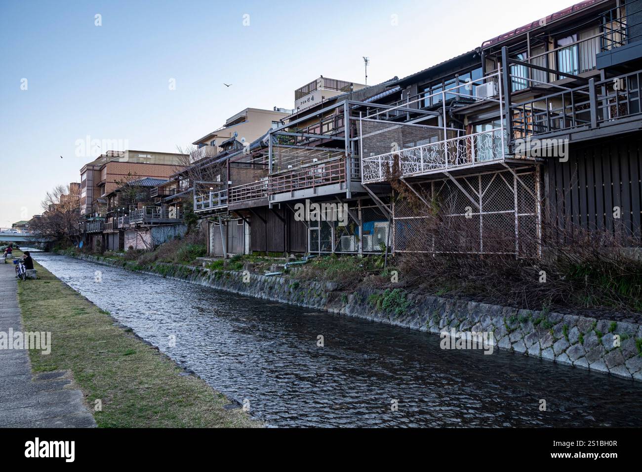 Enjoying a Spring afternoon along the Kamogawa River (Kamo River), ⁨Kyoto⁩, ⁨Japan⁩ Stock Photo