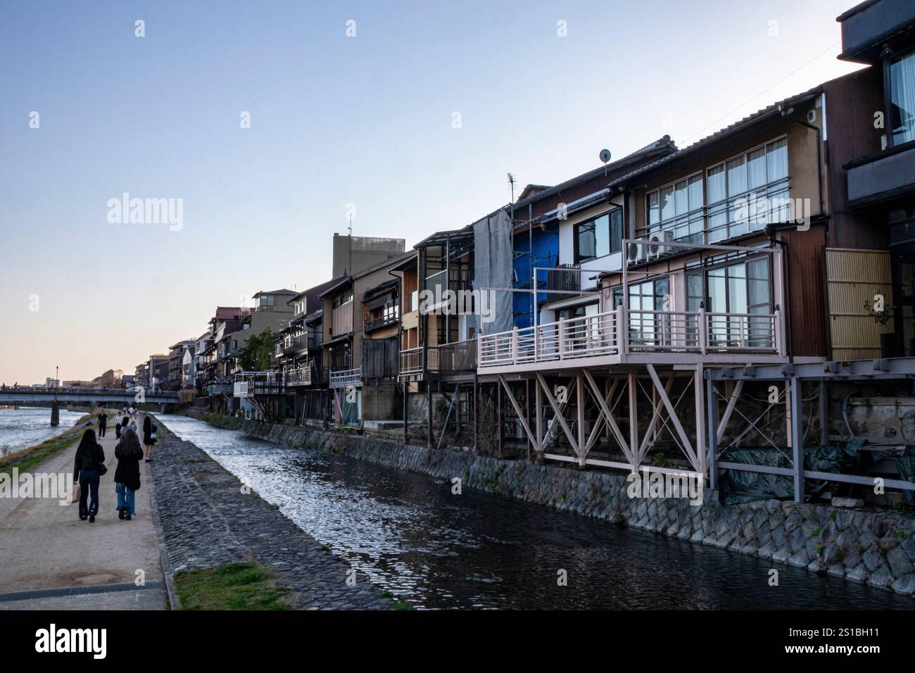 Enjoying a Spring afternoon along the Kamogawa River (Kamo River), ⁨Kyoto⁩, ⁨Japan⁩ Stock Photo