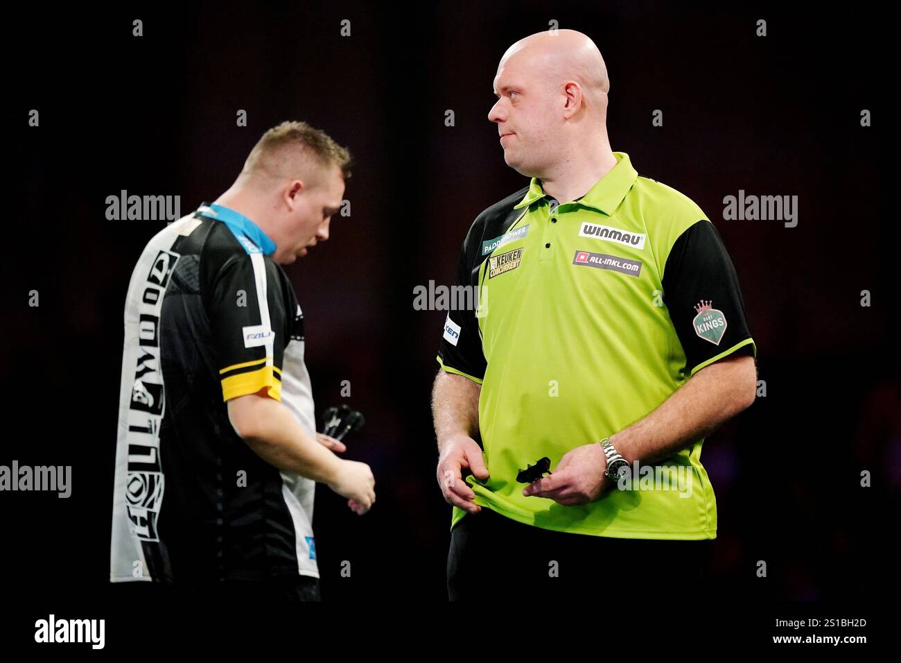 Michael van Gerwen (right) during their semifinal match against Chris