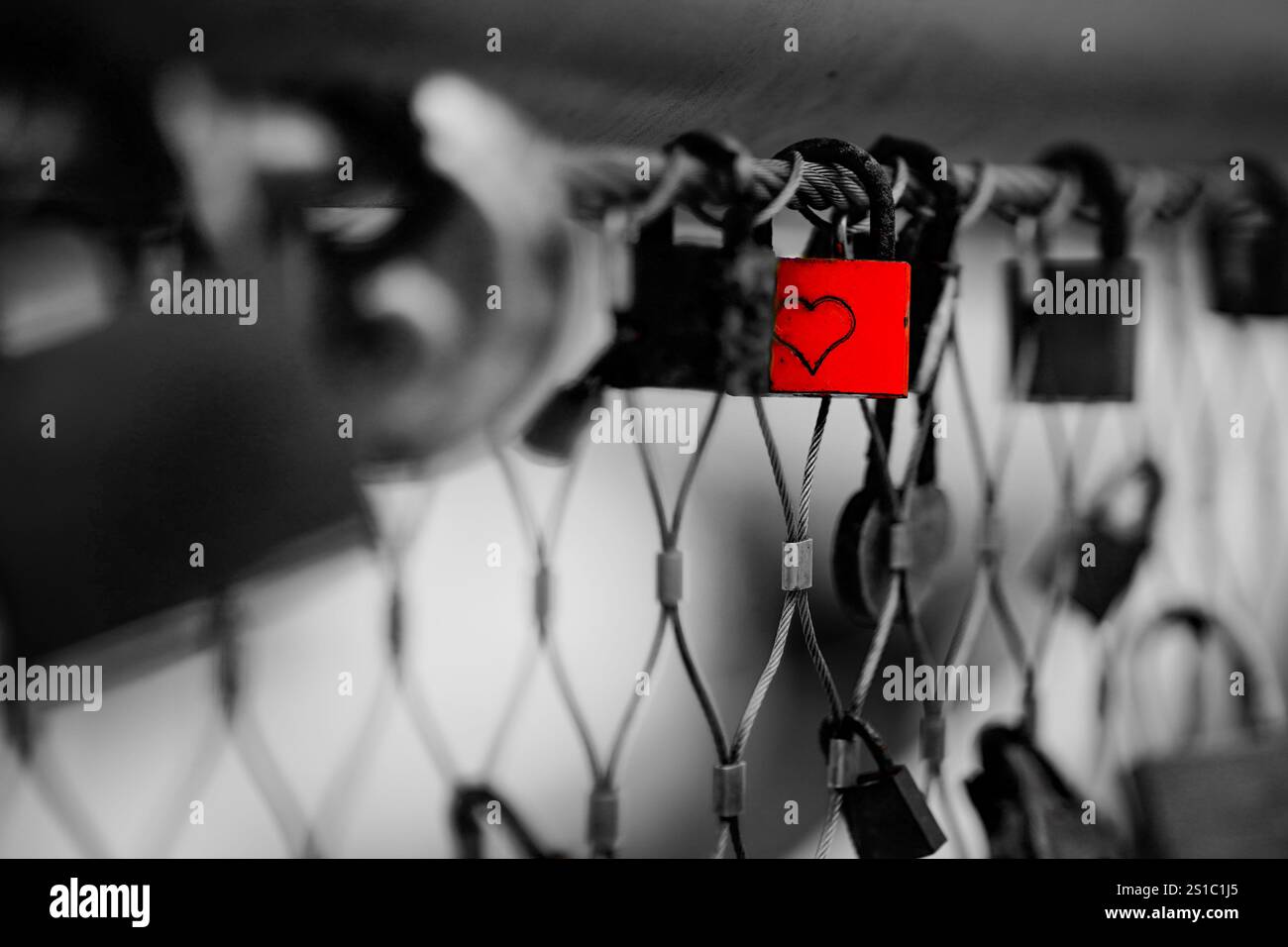 selective red locklet with a heartshape on it Stock Photo
