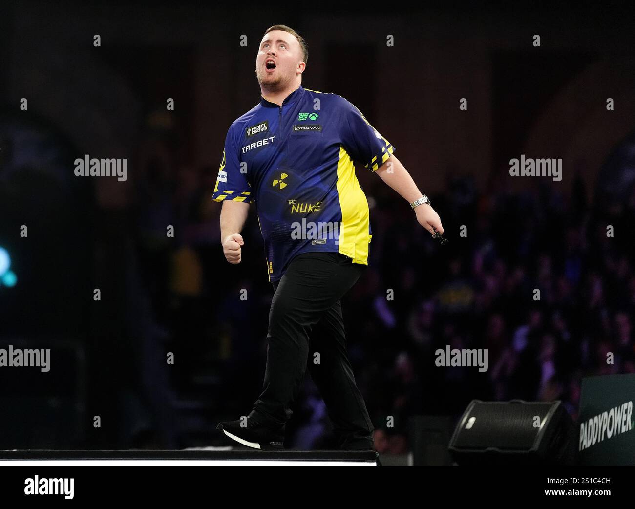 Luke Littler celebrates winning their semifinal match against Stephen