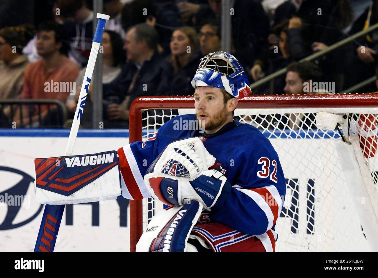 New York Rangers' Jonathan Quick kneels on the ice during a time out in ...