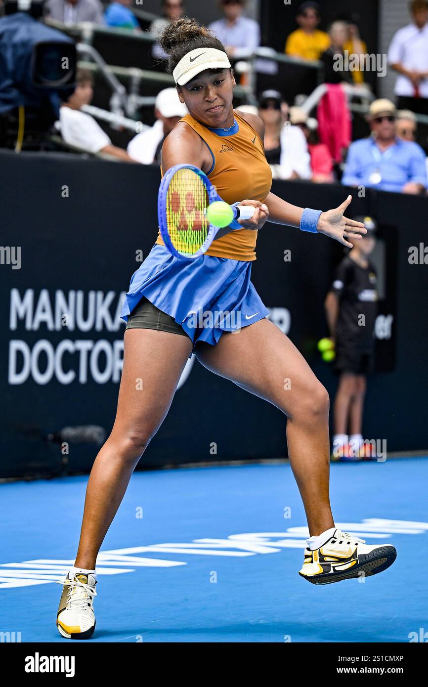 Naomi Osaka of Japan plays a shot against Hailey Baptiste of the U.S