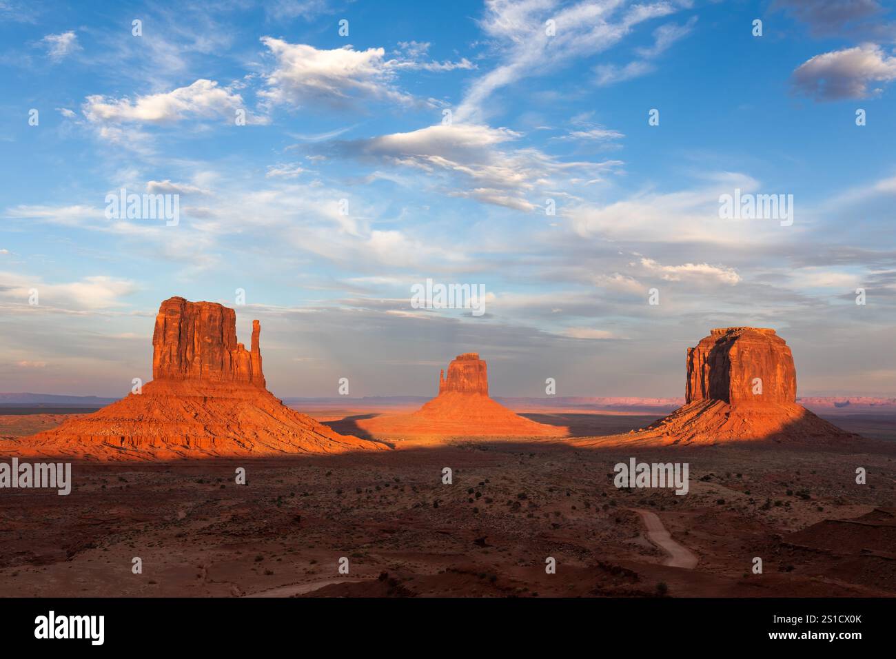 Sunset light on the Mittens in Monument Valley, Arizona Stock Photo