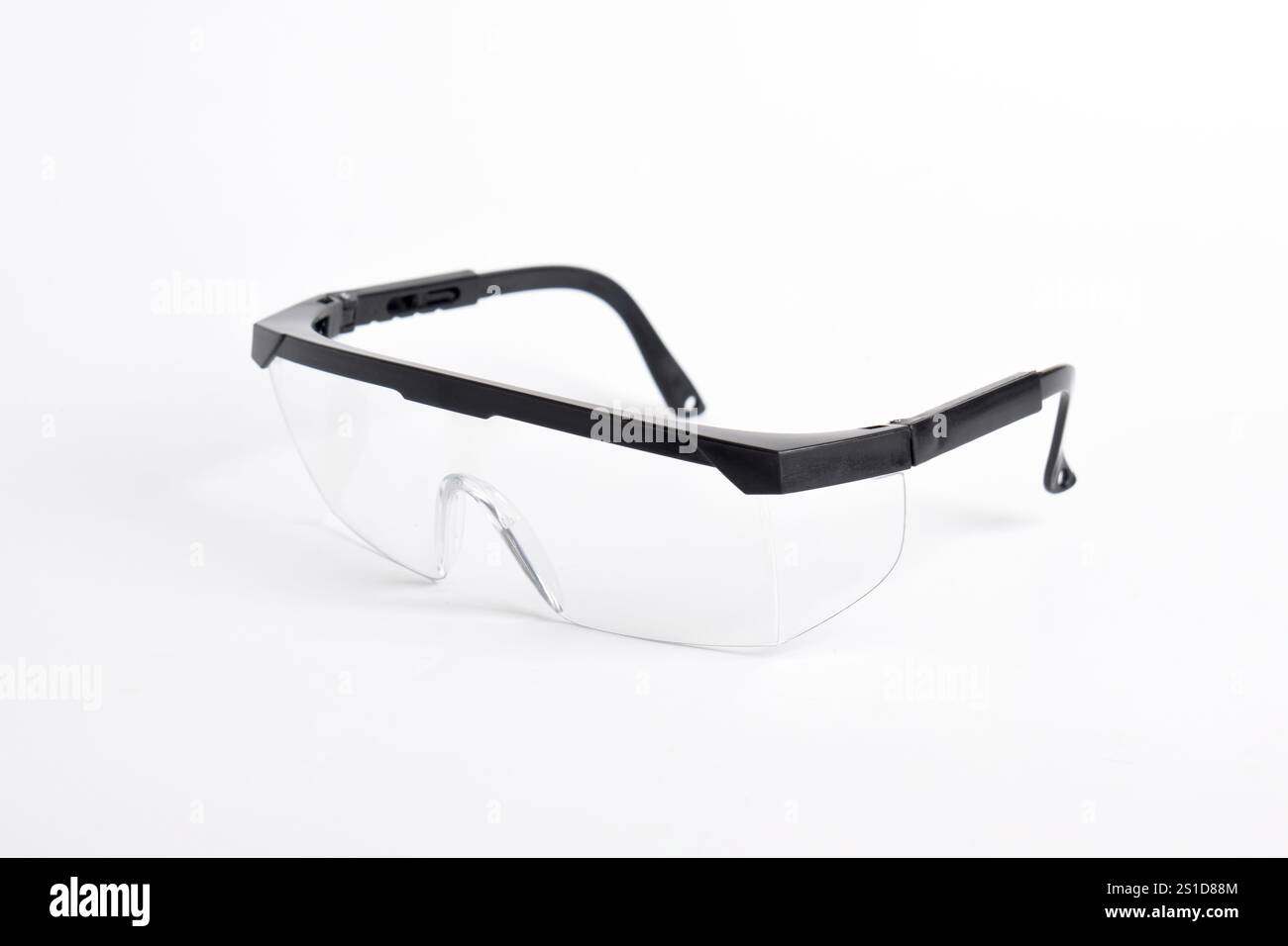Clear plastic safety goggles isolated on white background Stock Photo