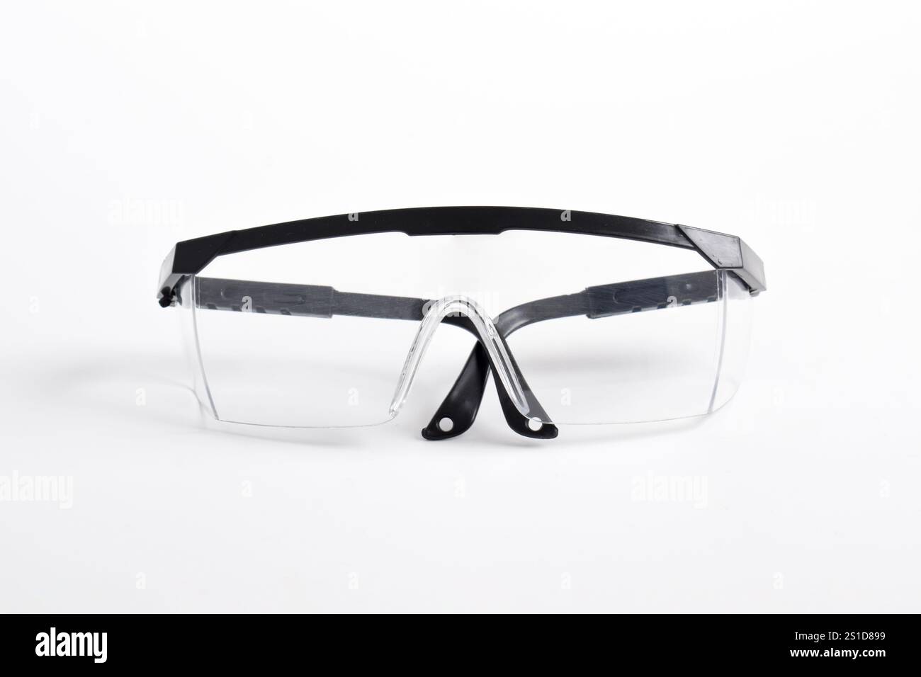 Clear plastic safety goggles isolated on white background Stock Photo
