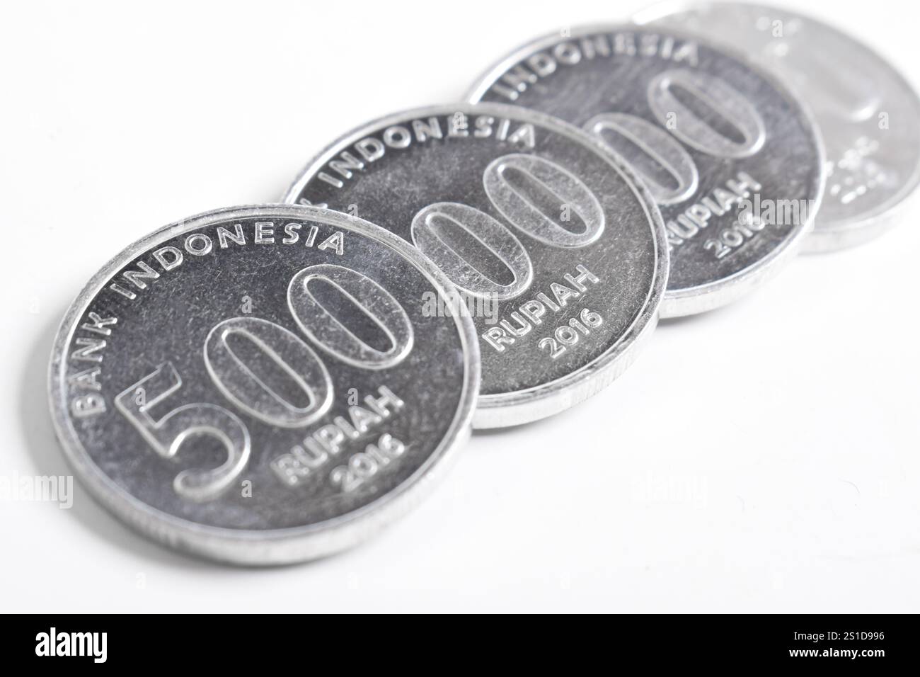 Silver coins isolated on white background. Indonesian rupiah coin ...