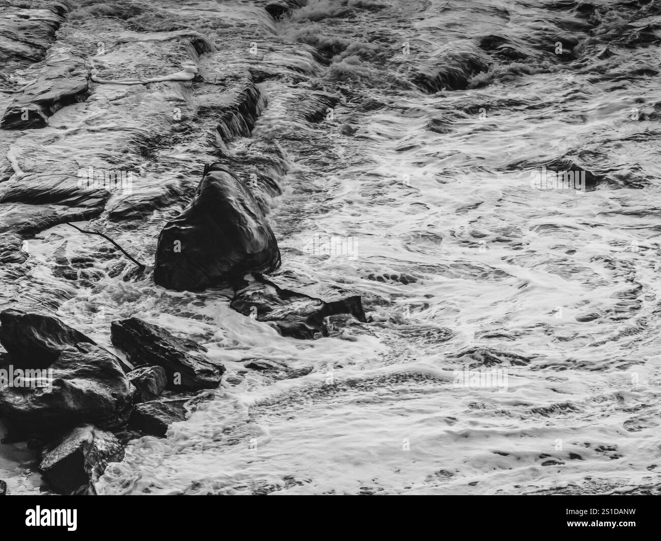 The sea and rocks in black and white at North Pearl Beach on the ...