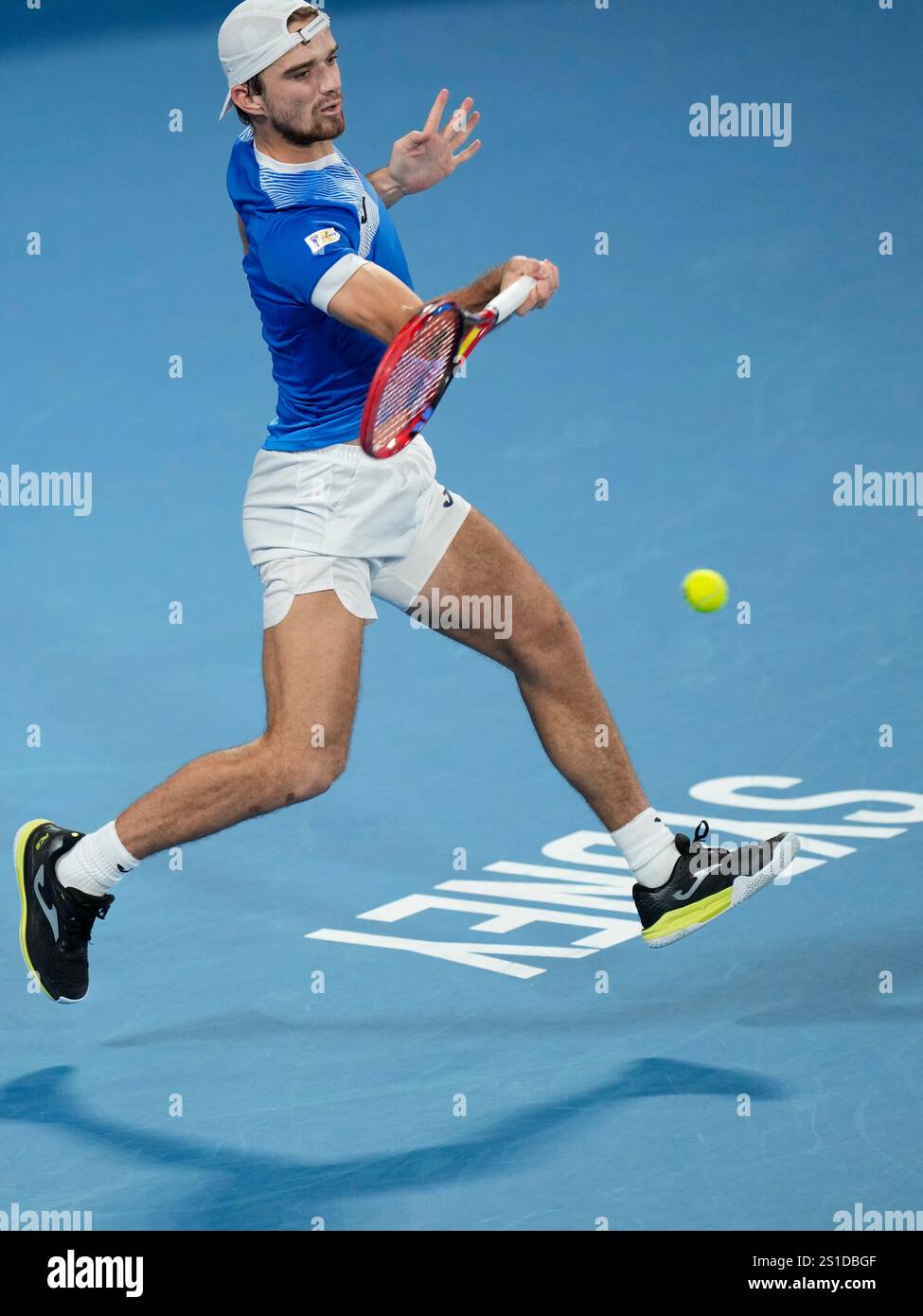 Czechia's Tomas Machac plays a forehand to Italy's Flavio Cobolli ...
