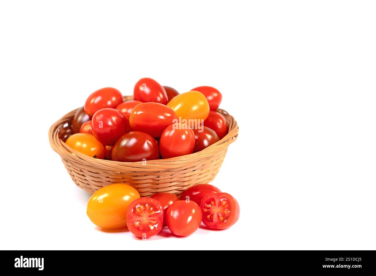 Various mini tomatoes against a white background Stock Photo