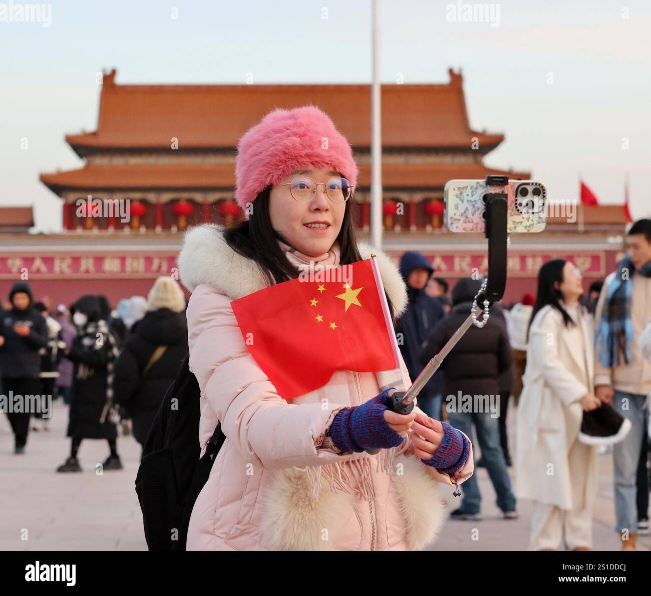 A grand flagraising ceremony is held at Tian'anmen Square to celebrate