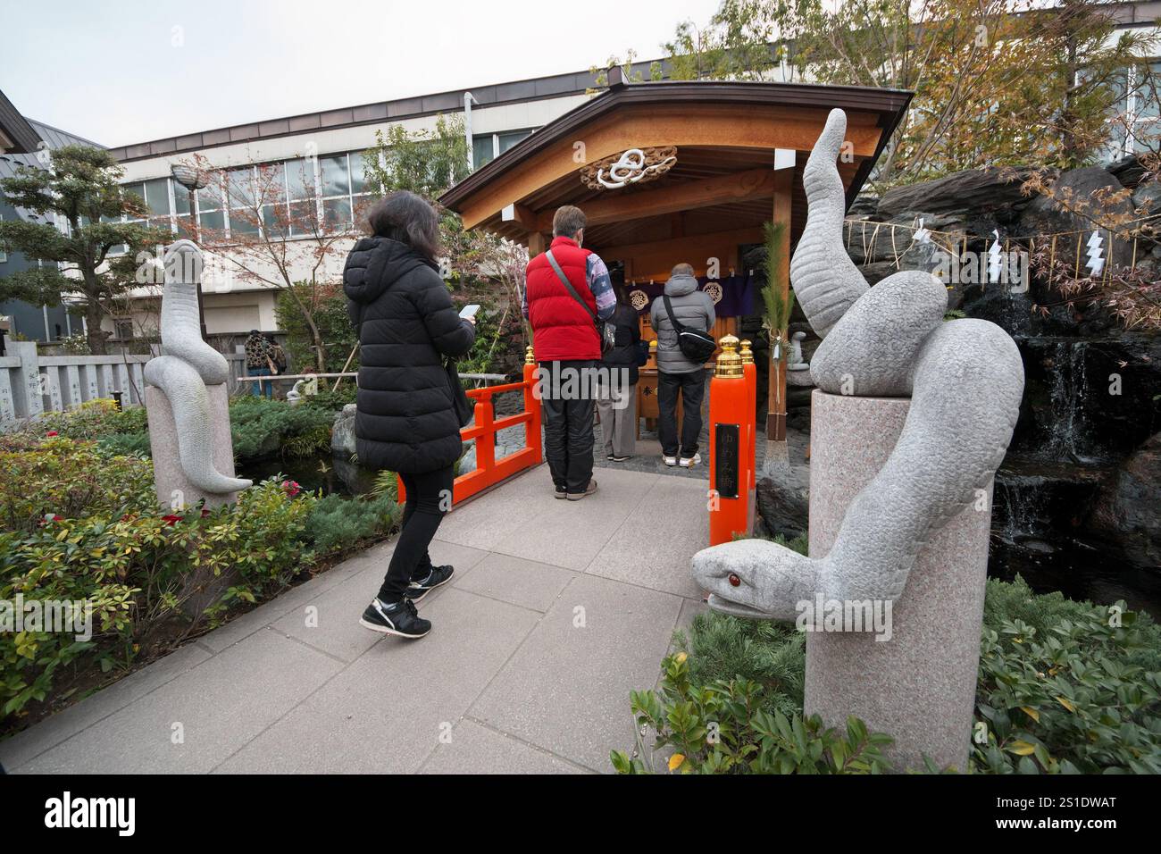 Worshipper pray at the Hebikubo Shrine in Tokyo, Japan on Friday