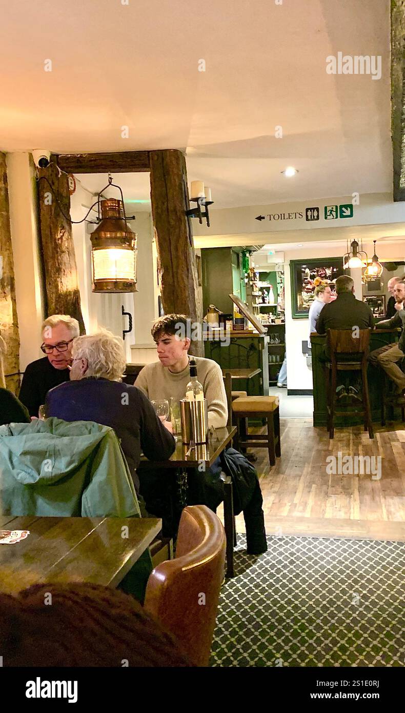 The Artichoke pub Public House Moulton Village Northampton Northamptonshire UK British England English eating food place old history warm - Smartphone Captured Stock Image