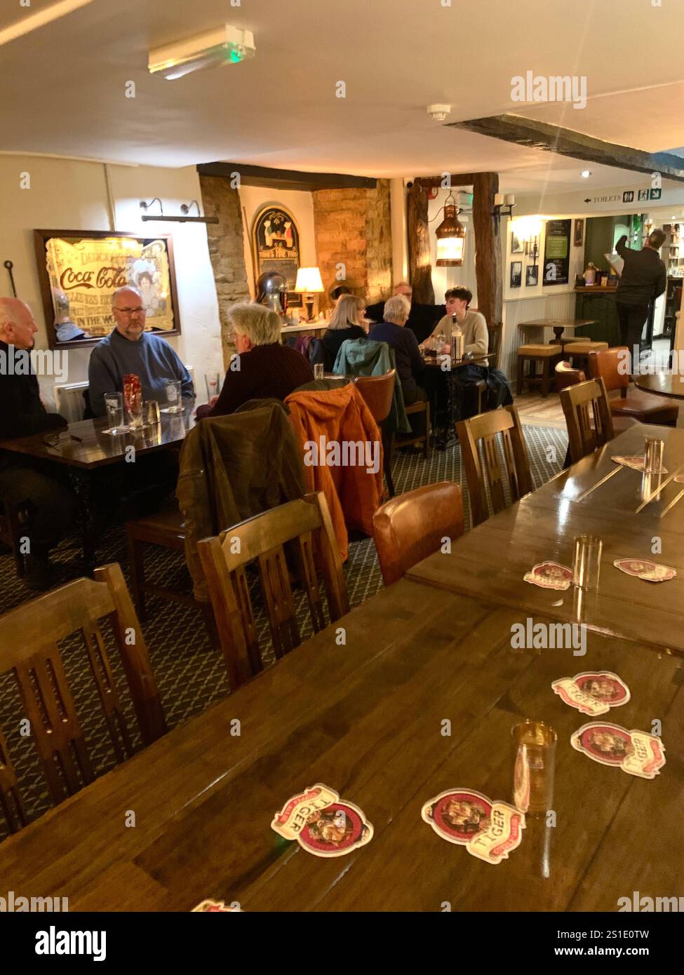 The Artichoke pub Public House Moulton Village Northampton Northamptonshire UK British England English eating food place old history warm - Smartphone Captured Stock Image