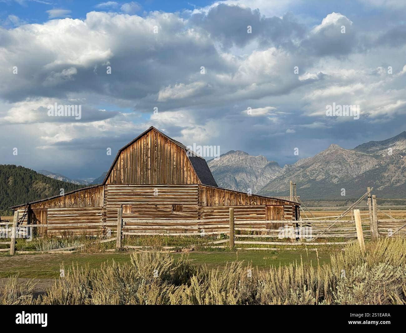 John Moulton barn, Mormon Row Histroric District, Grand Teton National Park mountain range, Wyoming, USA - Smartphone Captured Stock Image