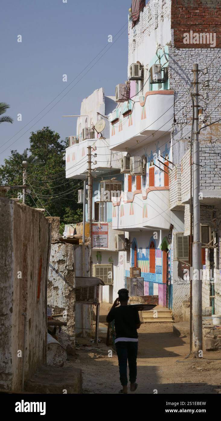 A Boy walking in a Street in Elephantine Island, Aswan, Egypt Stock Photo