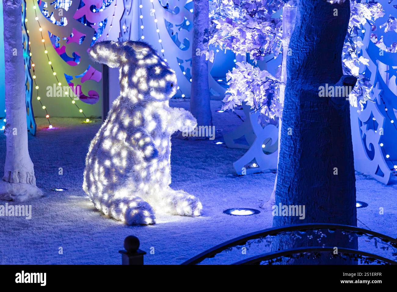 life-size figure of a rabbit in a decorative forest. fairytale rabbit ...