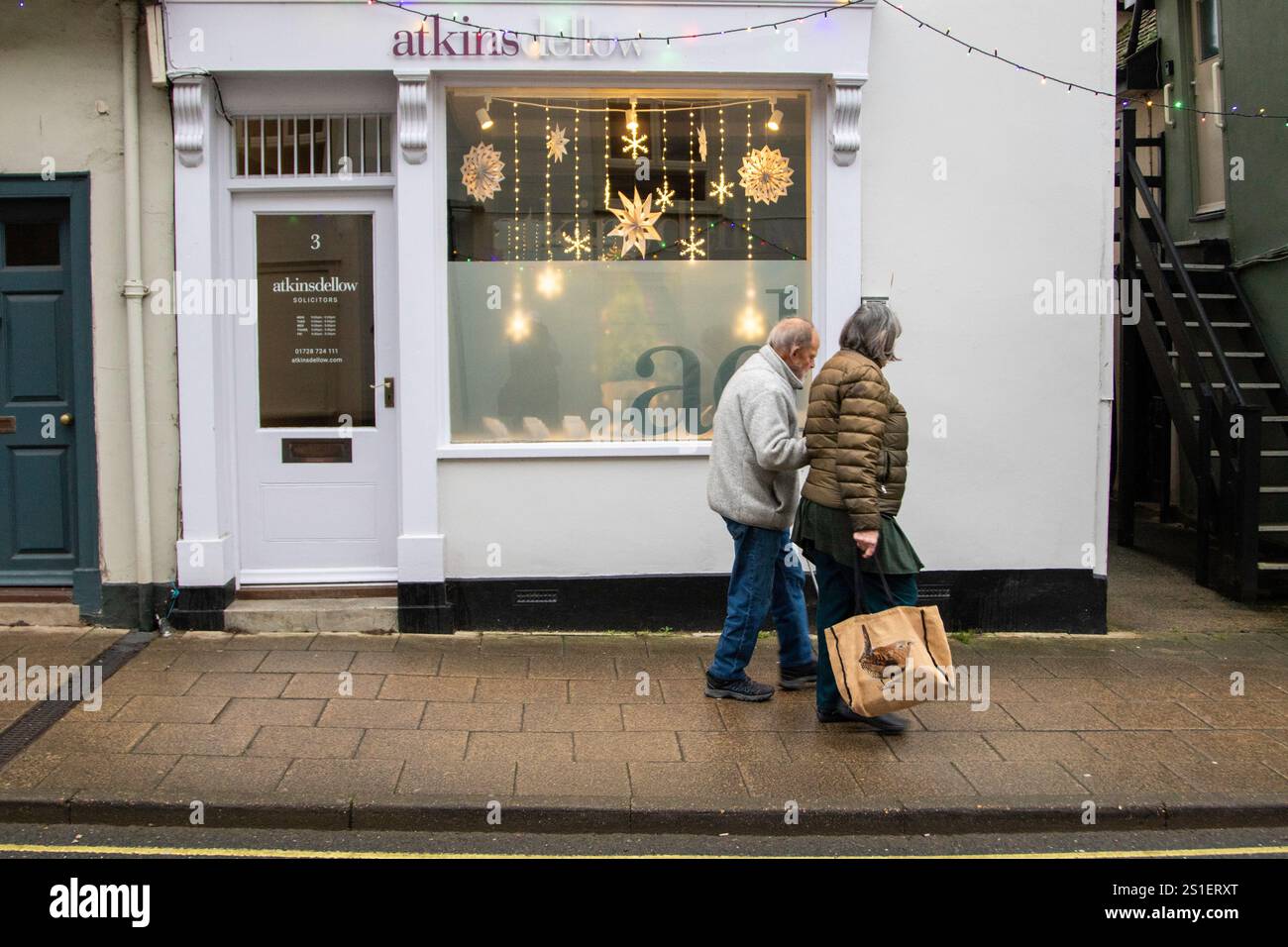 In a Suffolk market town solicitor's Atkins Dellow has elegantly simple hanging and lighted Christmas decorations in their recently painted office. Stock Photo