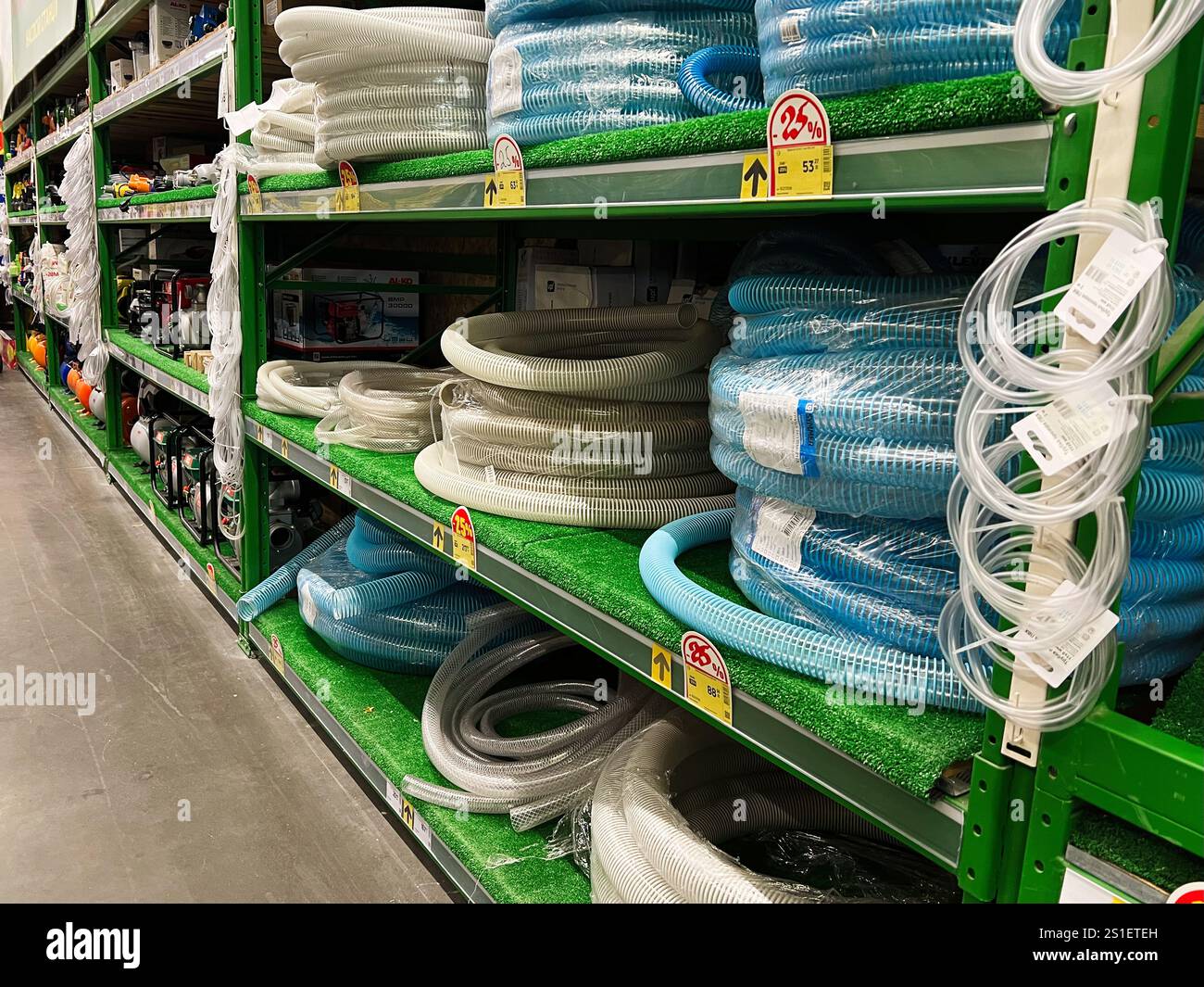 Kyiv, Ukraine - January 03, 2025: Wide selection of coiled hoses ...