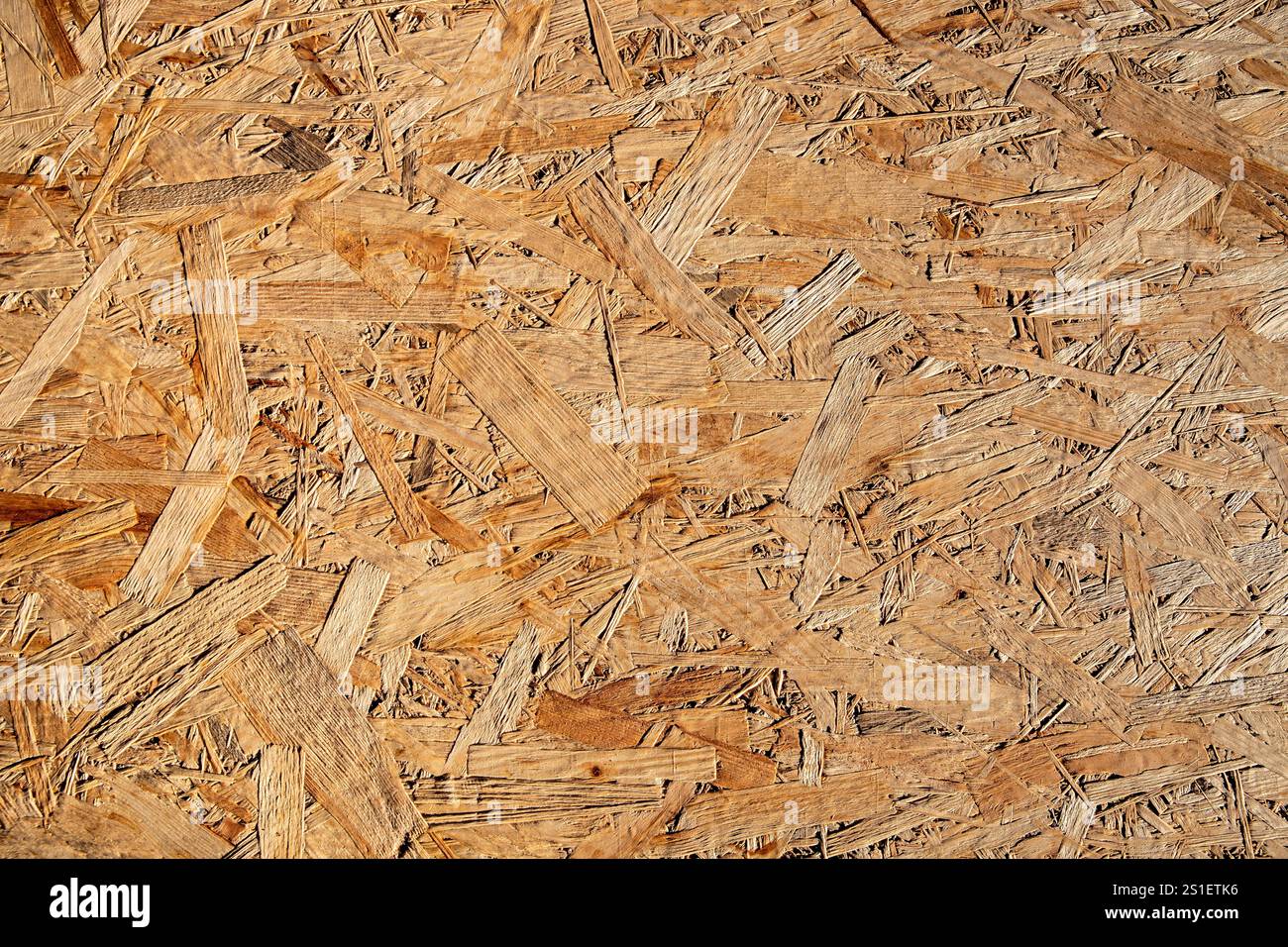 Close-up of OSB Board Texture: Abstract Wooden Particleboard Surface Stock Photo