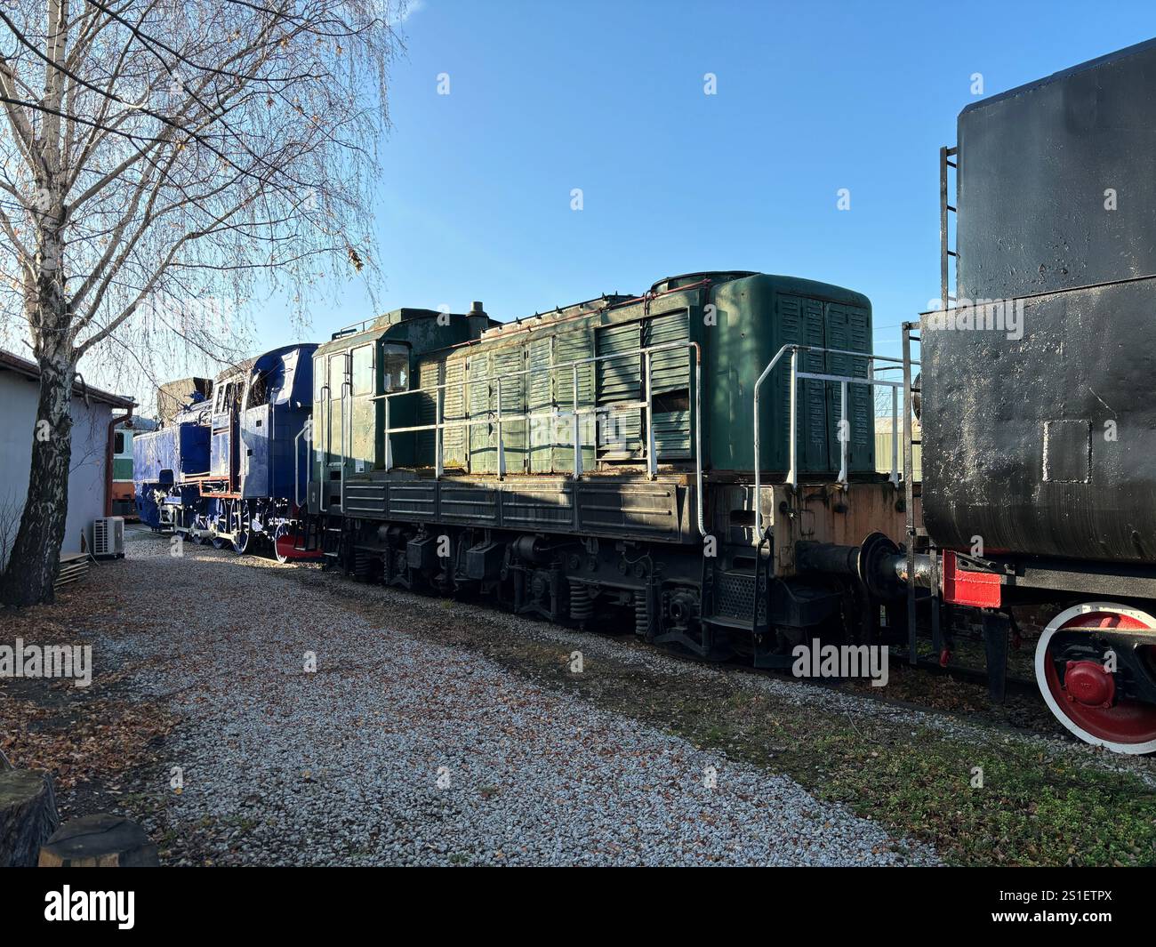 Old Polish Steam, Diesel and Electric locomotives at the Muzeum Kolejnictwa na Śląsku w Jaworzynie Śląskiej, Poland. Old Industrial Public Transport - Smartphone Captured Stock Image