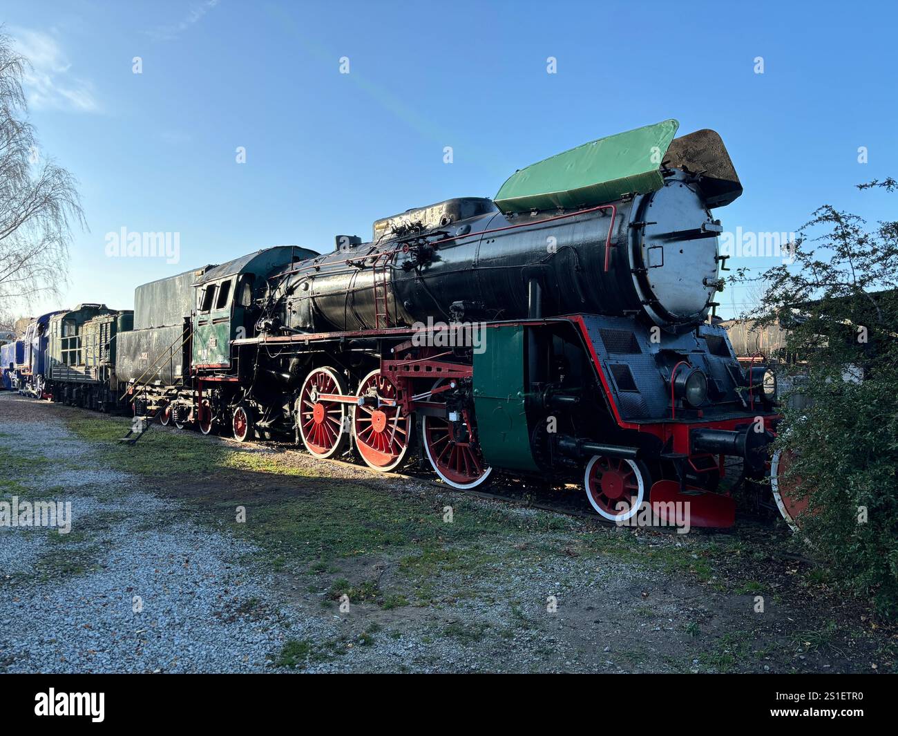 Old Polish Steam, Diesel and Electric locomotives at the Muzeum Kolejnictwa na Śląsku w Jaworzynie Śląskiej, Poland. Old Industrial Public Transport - Smartphone Captured Stock Image