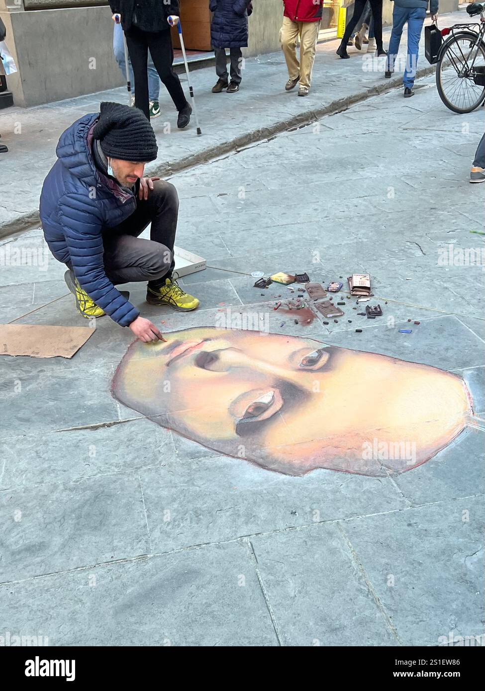 street artist in Florence, Italy drawing the mona lisa with pastels - Smartphone Captured Stock Image