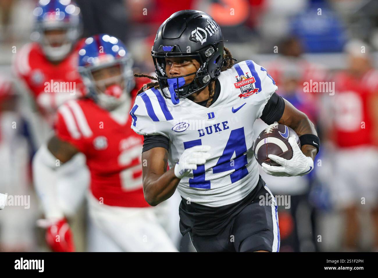Duke wide receiver Que'Sean Brown (14) runs the ball against